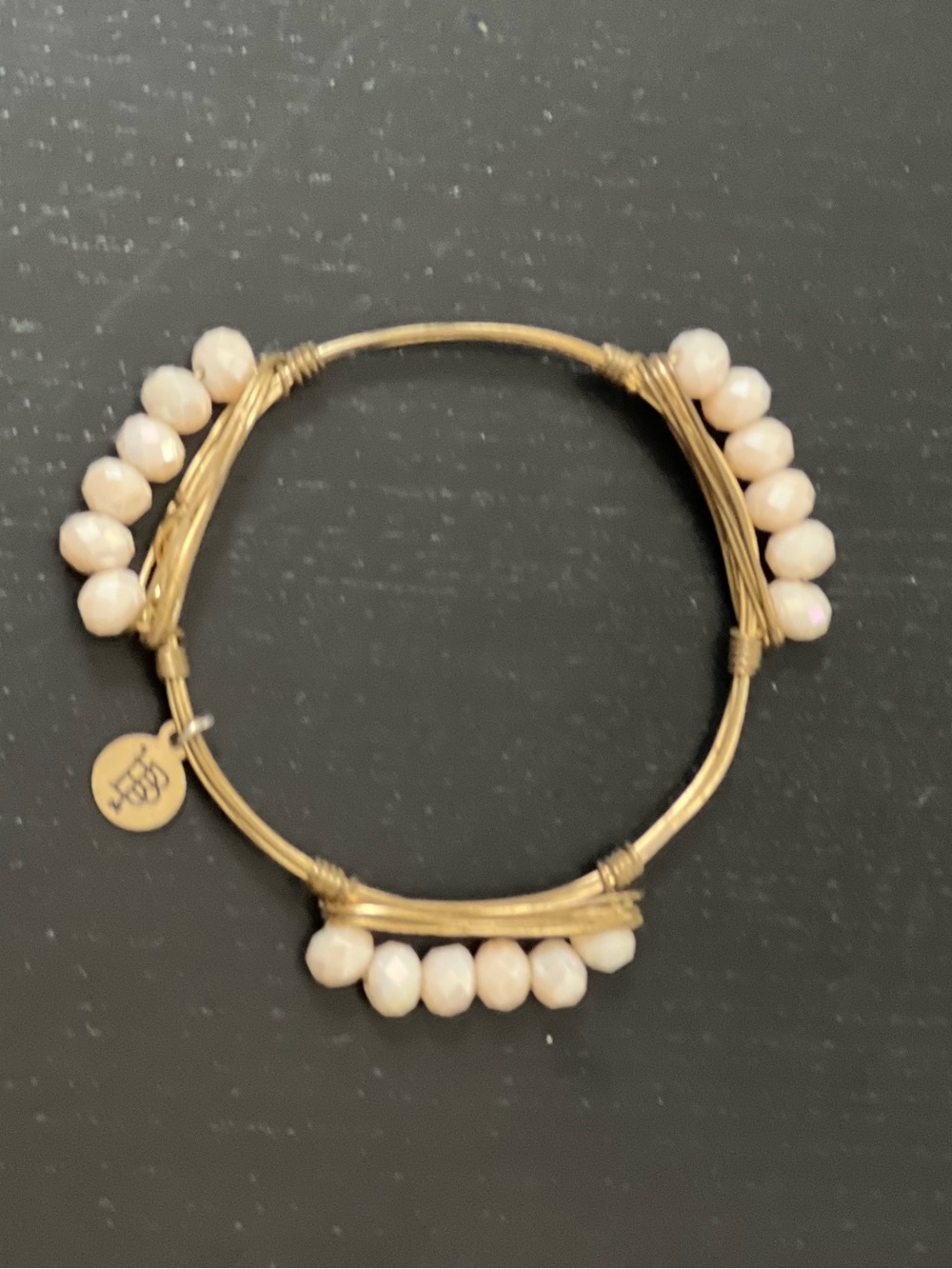 Bourbon and Bowties Gold Wire Bracelet with Cream Beads